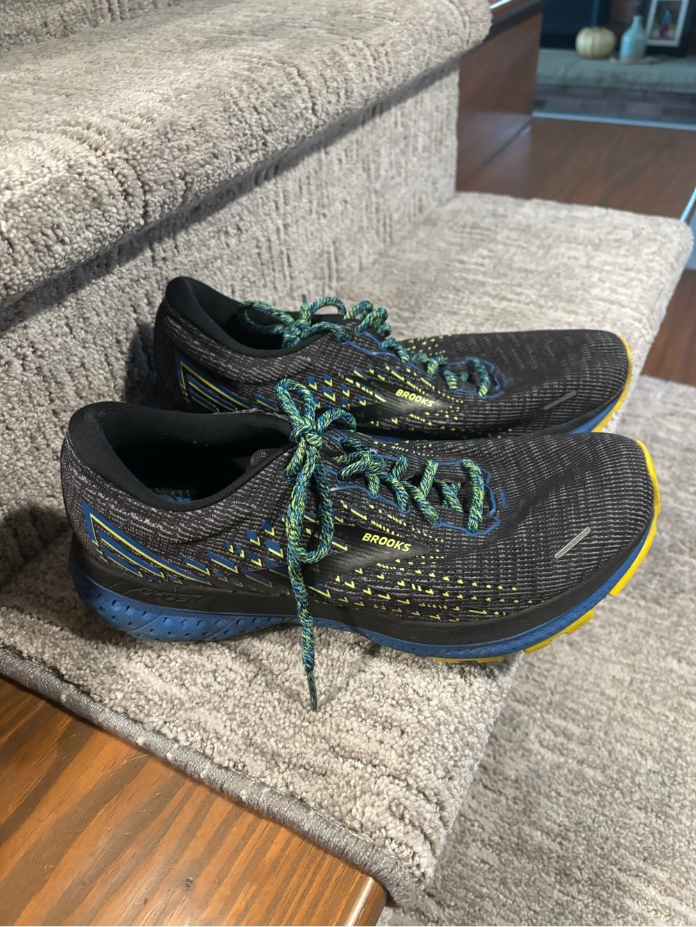 Brooks Men's Black Running Shoes with Blue and Yellow Accents size 10